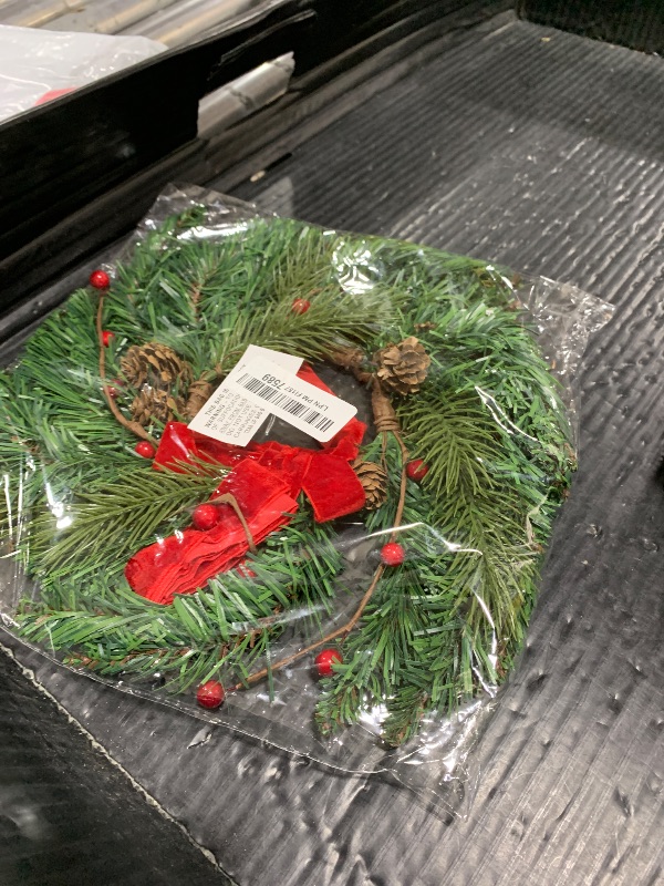Photo 1 of  Mini Christmas Wreath for Cabinets Kitchen, 12 Inch Small Christmas Wreaths with Lifelike Norfolk Pine Aspen Fir Tips Cones Red Berry Bow Xmas Door Wreath for Front Door Porch Wall Window Indoor