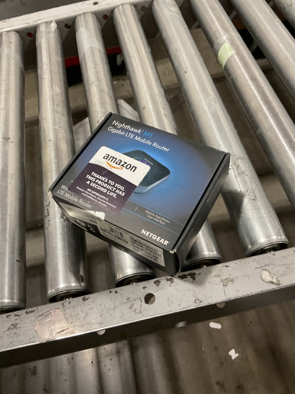 Photo 1 of NETGEAR Nighthawk M1 4G LTE WiFi Mobile Hotspot (MR1100-100NAS) – Up to 1Gbps Speed, Works Best with AT&T and T-Mobile, Connects Up to 20 Devices, Secure Wireless Network Anywhere