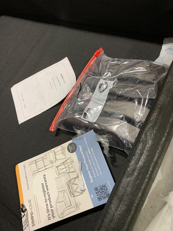 Photo 1 of Simpli Home Owen Coffee Table Storage Ottoman in Distressed