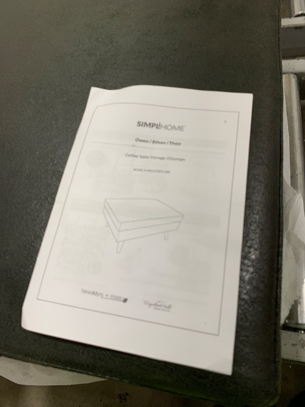 Photo 1 of Simpli Home Owen Coffee Table Storage Ottoman in Distressed