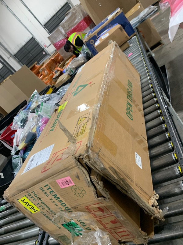 Photo 1 of National Tree Company 7.5 ft Pre-Lit Dunhill Fir Artificial Christmas Tree, 700 LED Lights, 2,514 Tips, Foot Pedal, 10 Light Functions, Includes Stand, Green