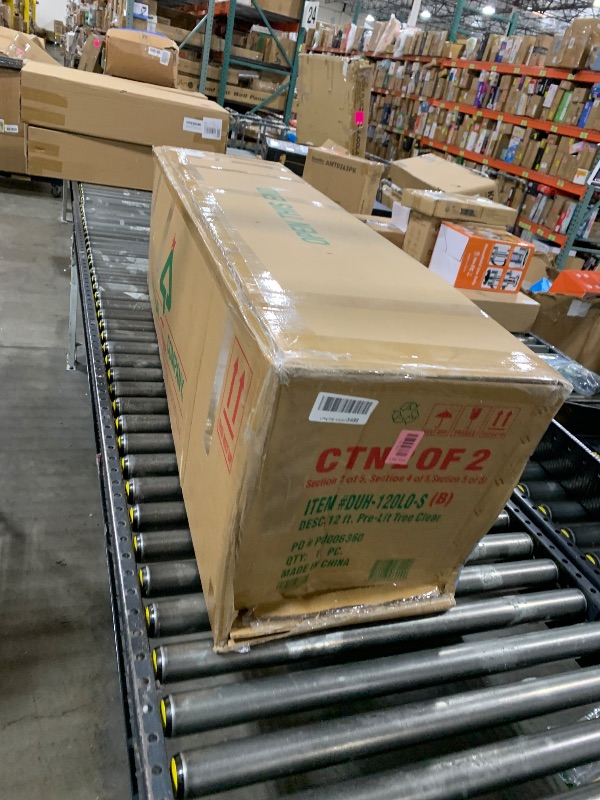 Photo 1 of National Tree Company 12 ft Pre-Lit Dunhill Fir Artificial Christmas Tree, 1,500 Clear Lights, 7,794 Tips, Includes Stand, Green