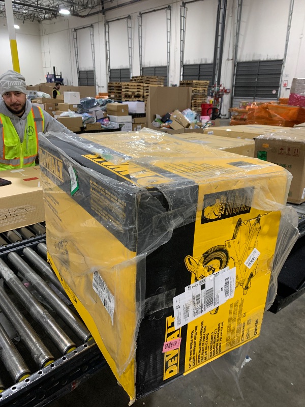 Photo 1 of DEWALT Miter Saw, 12-inch Double Bevel Sliding Compound Miter Saw with XPS LED Shadow Light System, Includes Blade Wrench, Material Clamp and Dust Bag (DWS780)