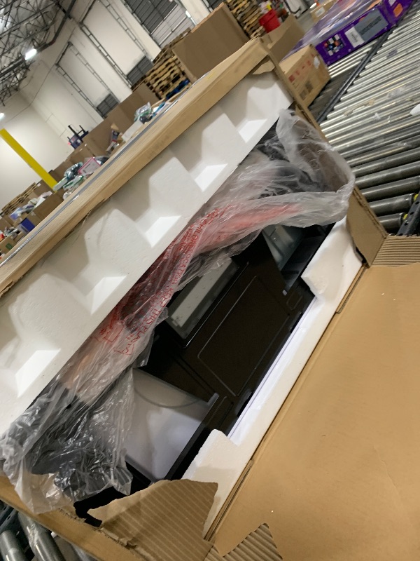 Photo 1 of BLACK+DECKER EM044KB19 Over The Range Microwave Oven with One Touch, 1000 Watts, 400 CFM and Auto Cooking, OTR 1.9 Cu.ft