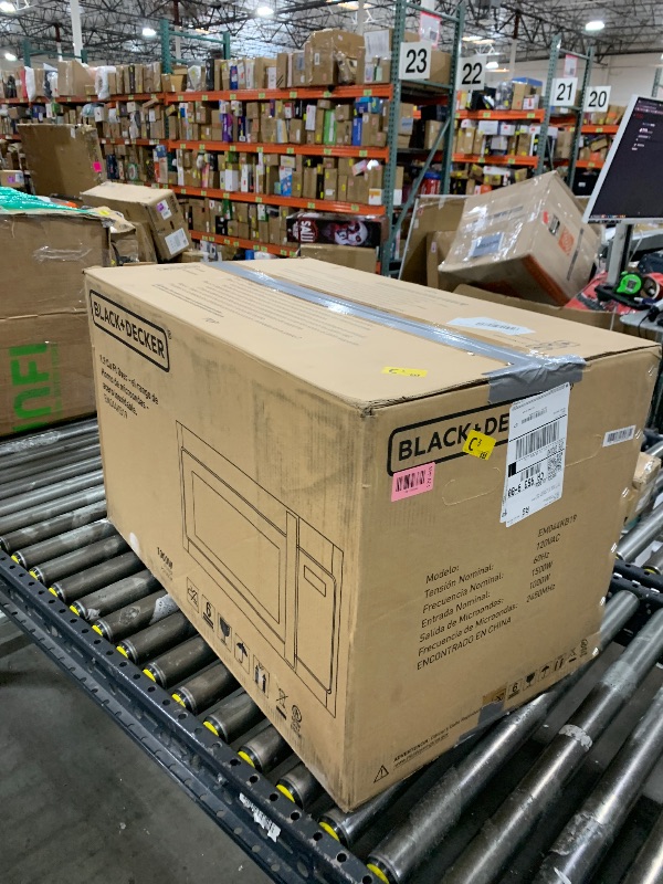 Photo 1 of BLACK+DECKER EM044KB19 Over The Range Microwave Oven with One Touch, 1000 Watts, 400 CFM and Auto Cooking, OTR 1.9 Cu.ft