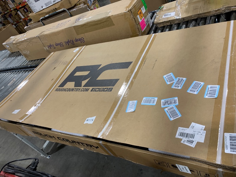 Photo 1 of Rough Country Hard Tri-Fold Tonneau Cover for Ram 1500 (2009-2018) 2500 (2011-2025) - Low-Profile Aluminum Truck Bed Cover, Fits 6'4 Bed (76.3")