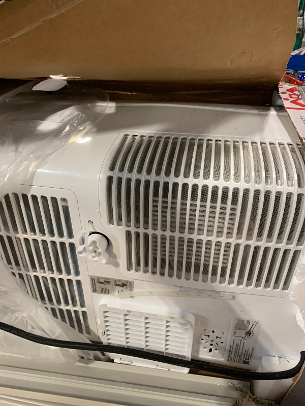 Photo 1 of ** VERY USED/ UNTESTED** DOMANKI 14000 BTU Portable Air Conditioner and Heater for Room up 700 Sq. Ft.,4-IN-1 Quiet Portable Ac Unit with Heater Dehumidifier Fan Function, Remote Control, Sleep Mode, 24H Timer (Black)