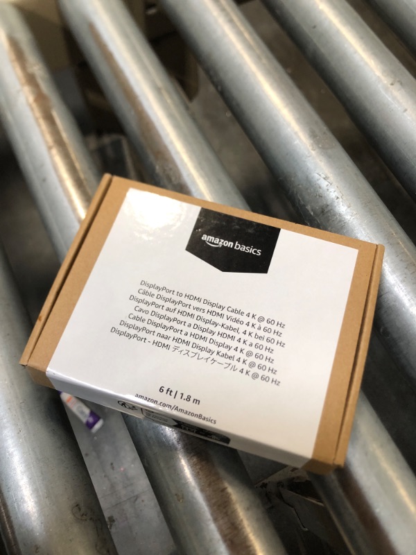 Photo 1 of Amazon Basics DisplayPort to HDMI Cable, Uni-Directional, 1080p, 1920x1200, 4K@60Hz, 6 ft, Gold-Plated Plug, Black