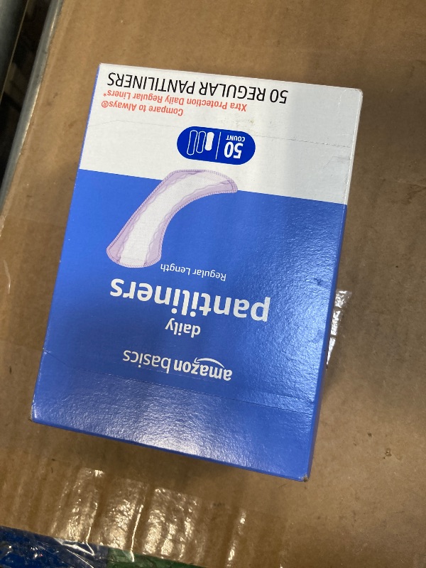 Photo 1 of ***Open box, PRODUCT NOT USED****Amazon Basics Daily Pantiliner, Regular Length, Pads for Women, Unscented, 50 Count (Previously Solimo)