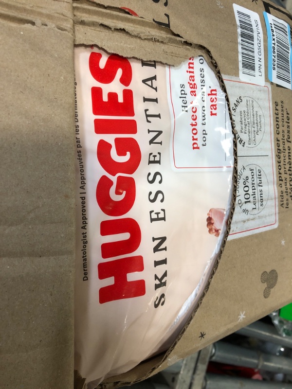 Photo 1 of **pack open**
Huggies Size 1 Diapers, Skin Essentials Baby Diapers, Size 1 (8-14 lbs), 204 Count (3 Packs of 68), Packaging May Vary