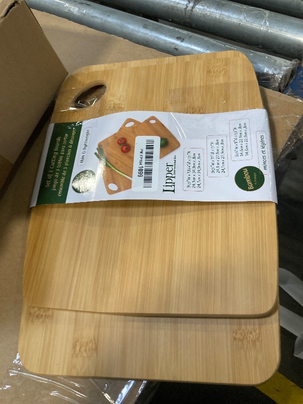 Photo 1 of **2 PCS**Lipper International Bamboo Wood Thin Cutting Board with Oval Hole in Corner, Assorted Sizes, Set of 3