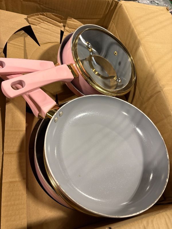 Photo 1 of **MISSING LARGE POT AND LIDS**
Paris Hilton Epic Nonstick Pots and Pans Set, Multi-layer Nonstick Coating, Tempered Glass Lids, Soft Touch, Stay Cool Handles, Made without PFOA, Dishwasher Safe Cookware Set, 12-Piece, Pink