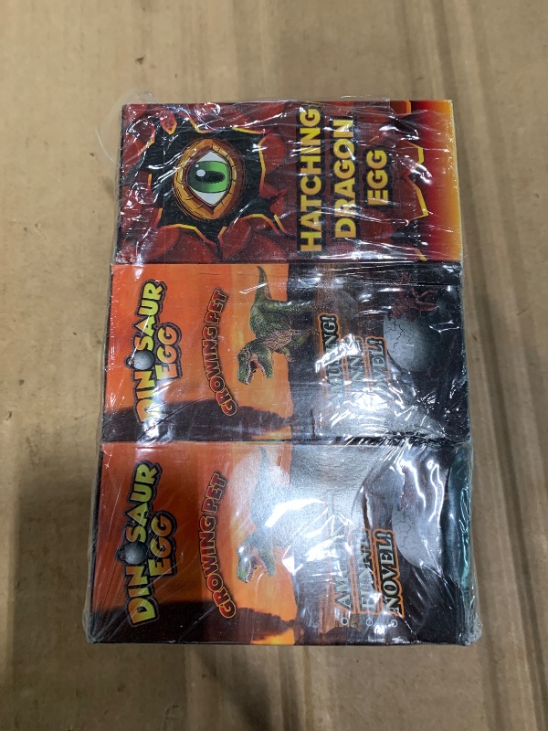 Photo 1 of *** PACK OF 3 *** Class Collections Surprise Growing Dragon and Dinosaur Hatch Egg Kids Novelty Toy - Pack of 4, Red
