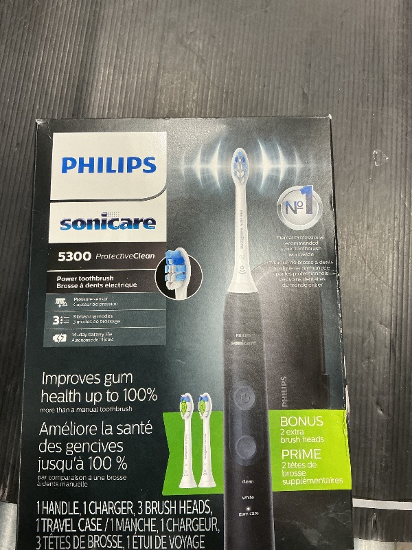 Photo 2 of Philips Sonicare ProtectiveClean 5300 Rechargeable Electric Toothbrush, with Pressure Sensor, 3 Cleaning Modes, SmarTimer and QuadPacer, with 2 Bonus Brush Heads, Travel Case, Black, Model HX6423/34