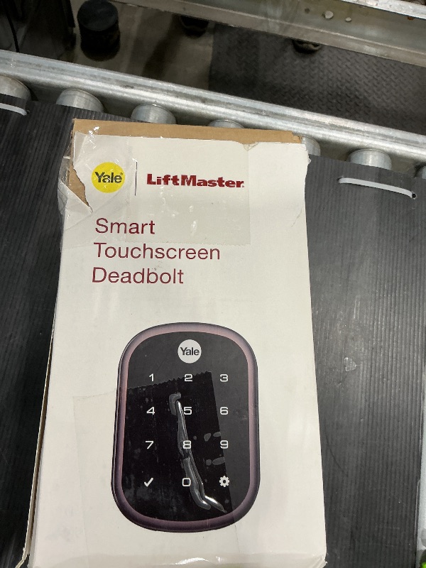 Photo 1 of **UNTESTED - MISSING PIECES**
Yale | LiftMaster Smart Lock with Touchscreen Deadbolt - Works with myQ App & Key by Amazon in-Garage Delivery when paired with Smart Garage Hub (sold separately), Oil Rubbed Bronze
