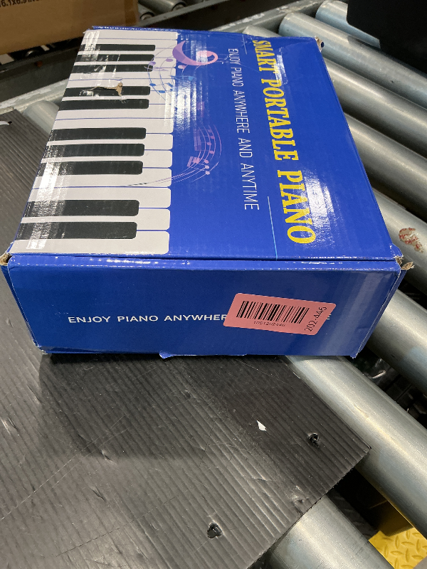 Photo 1 of POGOLAB 88 Keys Roll Up Keyboard Piano, Portable Electric Foldable Piano with Sustain Pedal, 14 Songs, 128 Tones, 128 Rhythms, Rechargeable & Dual BT Function, Music Gift for Beginners