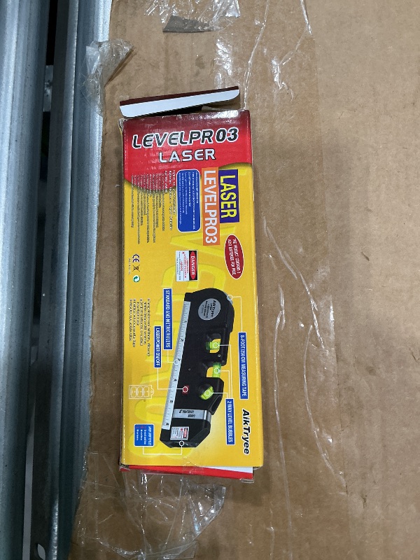 Photo 1 of **MISSING 1 BATTERY** Laser Level Line Tool, Multipurpose Laser Level Kit Standard Cross Line Laser leveler Beam Tool with Metric Rulers 8ft/2.5M for Picture Hanging cabinets Tile Walls by AikTryee.