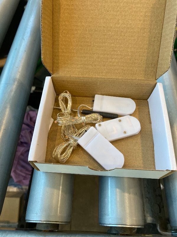 Photo 1 of **Missing**
WATERGLIDE 12 Pack Christmas Fairy Lights Battery Operated (Included), 7 ft 20 LED Mini String Lights, Waterproof Silver Wire Firefly Starry Light for DIY Wedding Party Mason Jars Decor, Pink