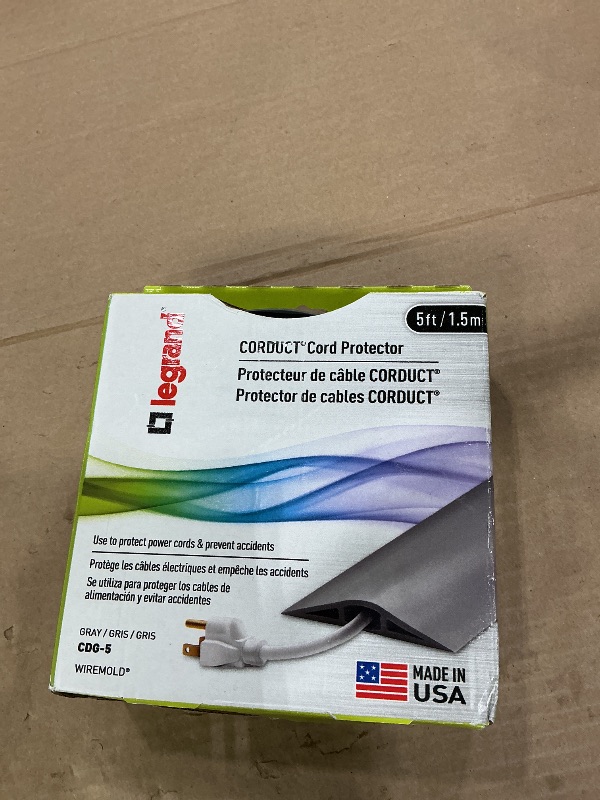 Photo 1 of C2G Wiremold Floor Cord Management Kit, Corduct, Cord Protector, Wire Organizer and Hider, Rubber Cable Cover and Concealer, Gray, 5 Feet, CDG-5