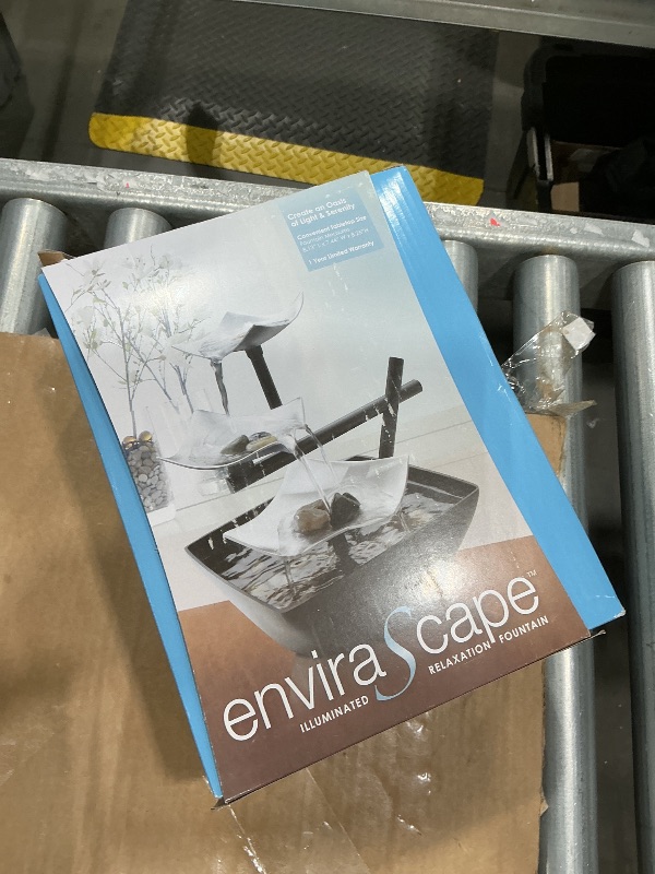 Photo 1 of **MINOR DAMAGE - USED**
Homedics Tabletop Water Fountain, Home Décor Soothing Sound Machine - Automatic Pump, Deep Basin & Natural River Rocks. Indoor Zen Relaxation for Office, Living Room, or Bedroom, 8.25” Tall