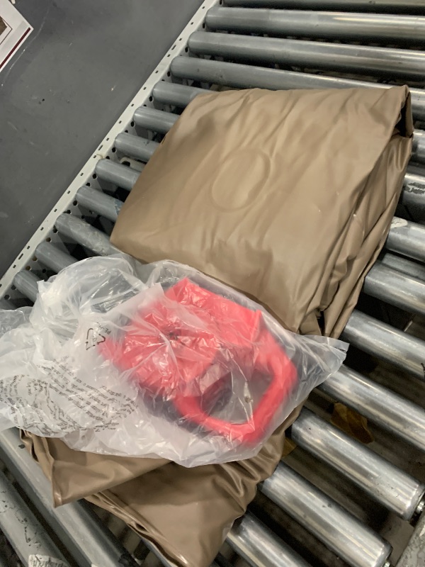 Photo 1 of ************HAS A SMALL HOLE THAT NEEDS PATCHING*************
brown air mattress with red air pump