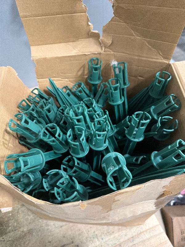 Photo 1 of *MISSING PIECES* Colingmill 100 Pcs Christmas Plastic Light Stakes 11.5 Inch Green Christmas Yard Stakes for C7 C9 Xmas Lights Outdoor Universal Yard Lawn Holiday Pole for Garden Lawn Path Walkway Holiday