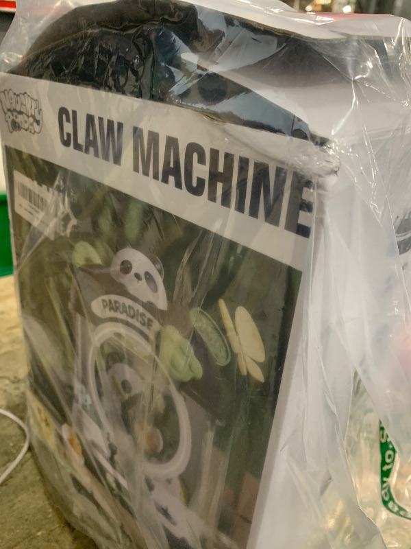 Photo 1 of Claw machine toy 