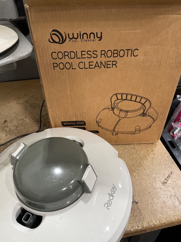 Photo 1 of (2025 Upgrade) Cordless Robotic Pool Cleaner, Lasts 80 Min, Automatic Vacuum for Above-Ground Pools up to 645 Sq.ft,Portable, Self-Parking (Transparent Blue) DIRTY