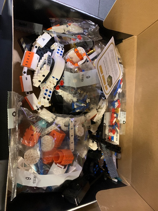 Photo 1 of OWNONE 1 Space Station Building Set with Motor and LED Lights - 360°Rotating Space Shuttle Rocket Model Building Kits with Display Stand, STEM Engineering Gift for Adults Men Kids (1583 PCS)