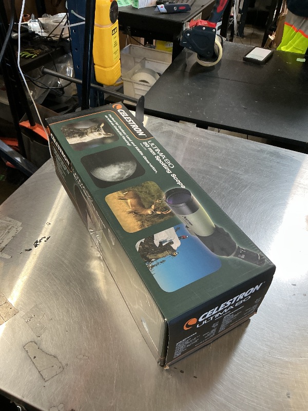 Photo 1 of Celestron 52250 Ultima 20-60x80mm Angled Refractor Spotting Scope Telescope with Multi-Coated Optics, Waterproof Rubber Tubing and Soft Carry Case, Green