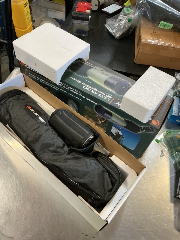 Photo 1 of Celestron 52250 Ultima 20-60x80mm Angled Refractor Spotting Scope Telescope with Multi-Coated Optics, Waterproof Rubber Tubing and Soft Carry Case, Green