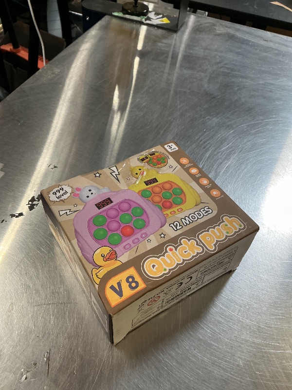 Photo 1 of Quick Push Pop Fidget Toys for Kids & Adults, 12 Game Modes Upgraded Light Up Fast Push Bubble Handheld Toy, Stress Relief Party Favors, Christmas & Birthday Gifts for 3-12 (Rabbit)