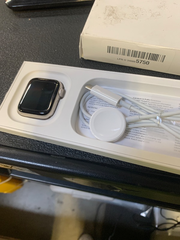 Photo 1 of Apple Watch SE (2nd Gen) [GPS 40mm] Smartwatch with Starlight Aluminum Case with Starlight Sport Band S/M. Fitness and Sleep Trackers, Crash Detection, Heart Rate Monitor, Retina Display