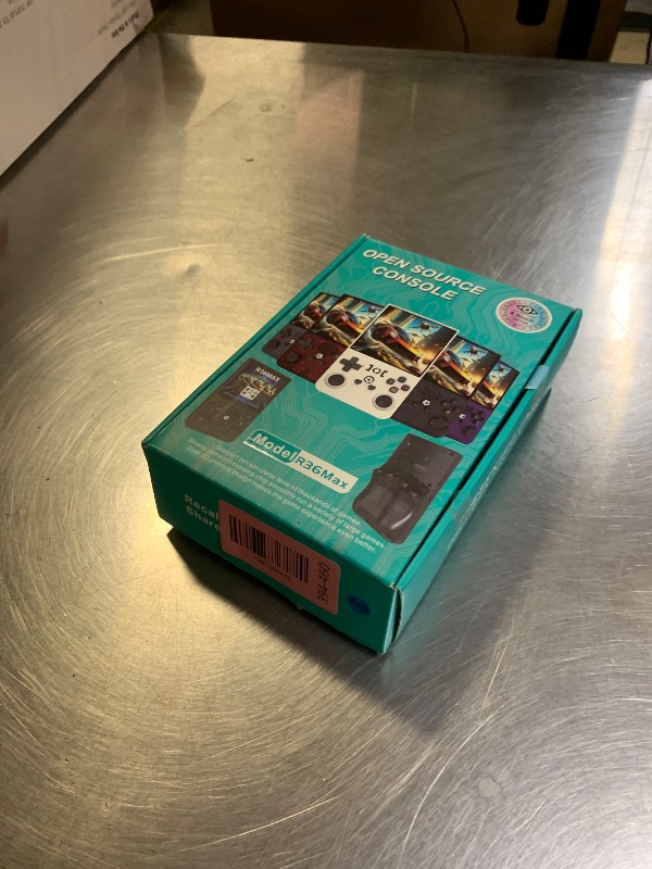 Photo 1 of ?R36MAX 4000mAh Portable Rechargeable Handheld Retro Game Console,Comfort Non-Slip Handheld Standing Retro Game Console with 64G TF Car,4.0-inch Screen,for Office,Blue