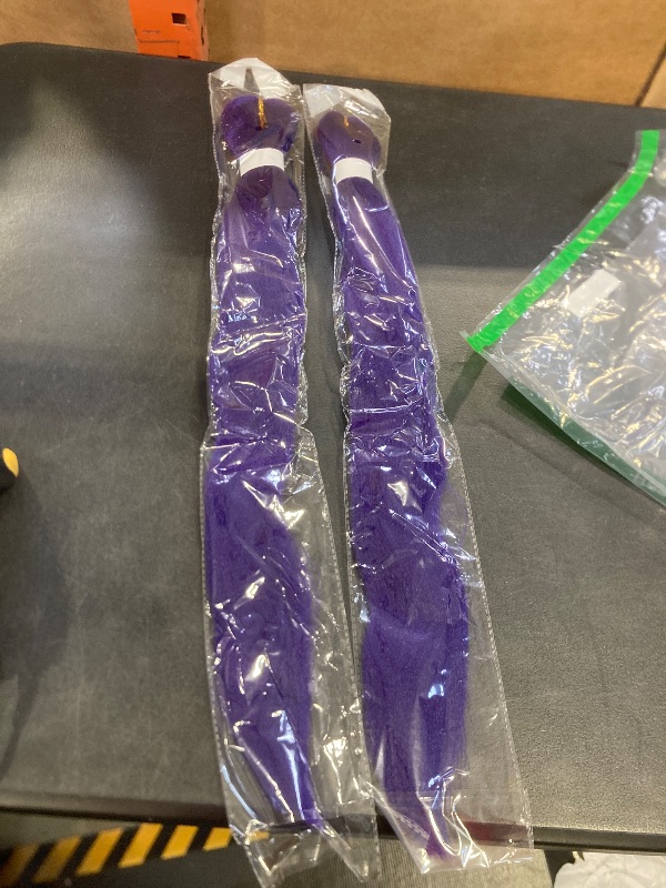 Photo 1 of 2 purple hair bundles