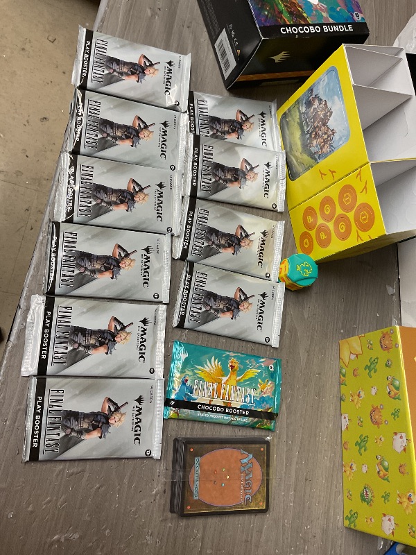 Photo 1 of Magic: The Gathering - Final Fantasy Chocobo Bundle (1 Chocobo Booster, 10 Play Boosters, 1 Alt-Art Promo Card, 1 Scene Card, 32 Basic Lands, 1 Click Wheel, and More)