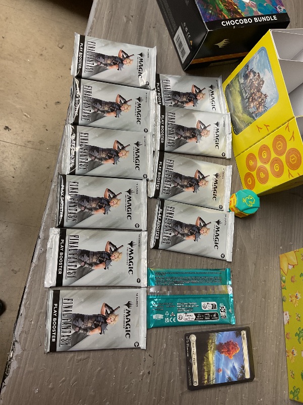 Photo 1 of Magic: The Gathering - Final Fantasy Chocobo Bundle (1 Chocobo Booster, 10 Play Boosters, 1 Alt-Art Promo Card, 1 Scene Card, 32 Basic Lands, 1 Click Wheel, and More)