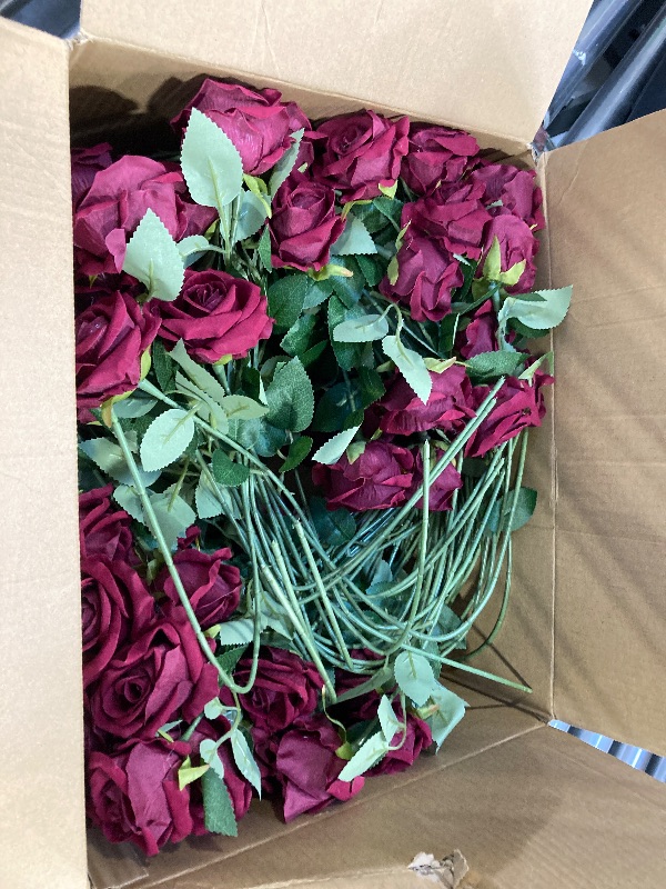 Photo 1 of Jexine 100 Pieces Artificial Roses Flowers Bulk, Long Stem Realistic Fake Silk Roses Bouquet for Table Centerpiece Vases Wedding Party Kitchen Decor(Wine Red)