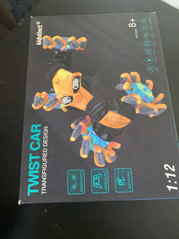 Photo 1 of 1:12 Gesture Sensing RC Stunt Car, 4WD Hand Controlled Remote Control Twist Cars with Light & Music, 360° Rotate Transform Drift, Gifts for 6-8-12 Kids Age 6 7 8 9 10 11 12 Yrs Old?