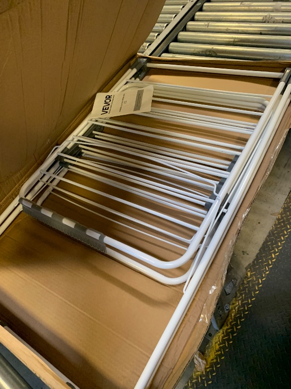 Photo 1 of VEVOR Clothes Drying Rack, 4-Tier Foldable Laundry Dryer Rack, Metal Drying Racks with 24 Drying Rods, Free-Standing and Portable Hanger with 4 Castors and Two Side Wings for Outdoor & Indoor Use