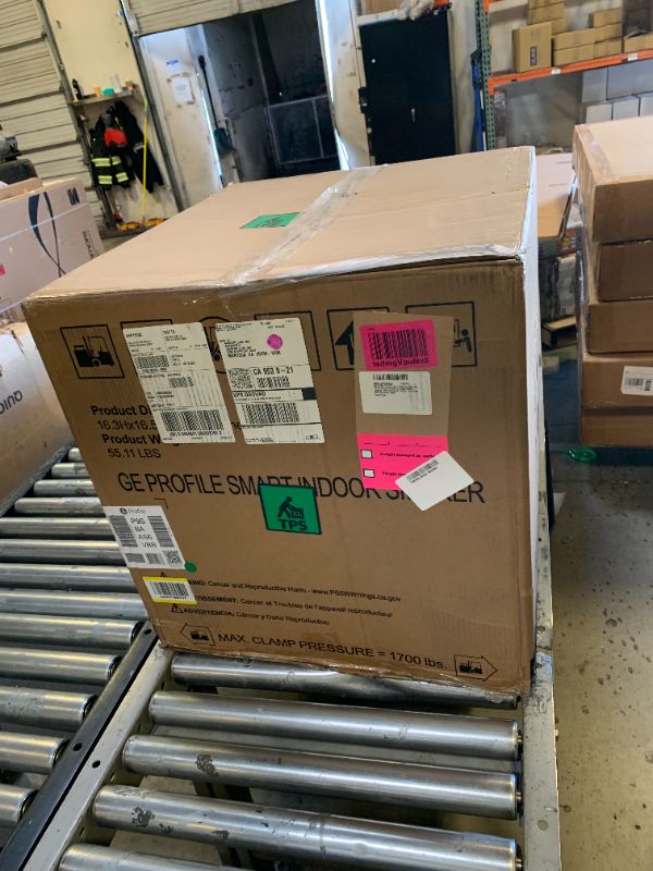 Photo 1 of GE Profile™ Smart Indoor Pellet Smoker, with Active Smoke Filtration, 5 Smoke Control Settings, WiFi Connected, Electric, Countertop BBQ Appliance, Black