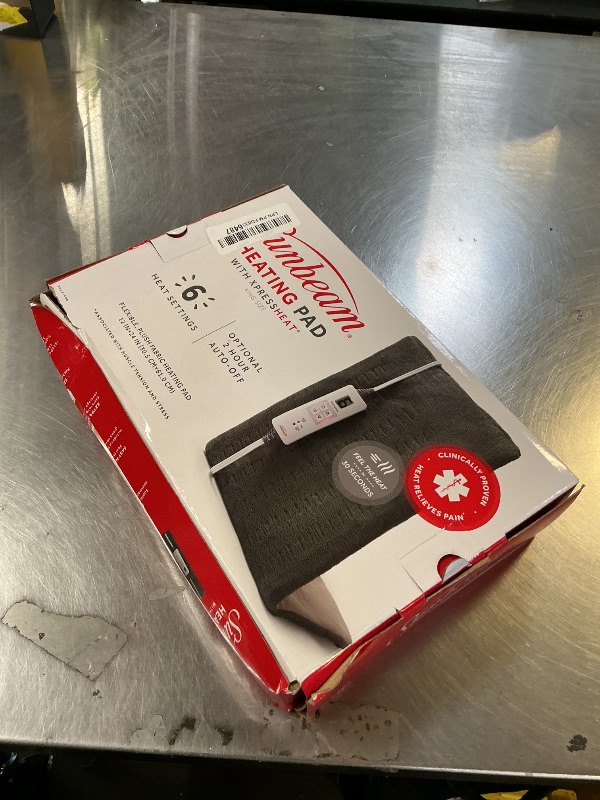 Photo 1 of Sunbeam XL Heating Pad for Back Neck and Shoulder Pain Relief Auto Shut Off 6 Heat Settings Extra Large 12 x 24 Green Ideal for Muscle Aches and Arthritis Pain