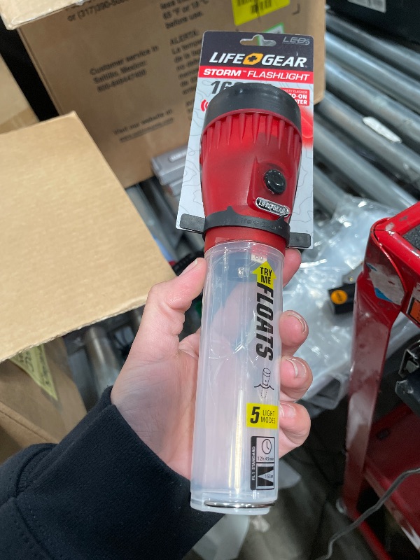 Photo 1 of *** CHECK COMMENTS***      Life Gear LED Flashlight with Glow Handle, Emergency Flasher and Storage Compartment, RED,White/Red