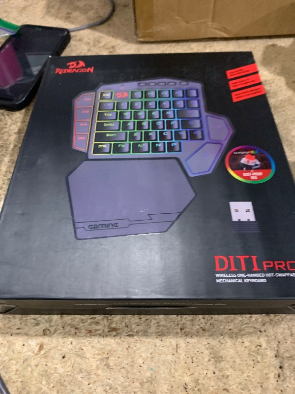 Photo 1 of **FOR PARTS/ NON-FUNCTIONAL** Redragon K585 PRO Wireless One-Handed Mechanical Keyboard, 42 Keys 3-Mode RGB 40% Gaming Keypad w/ 7 Onboard Macro Keys, Detachable Wrist Support, Rechargeable Battery (Red Switch)