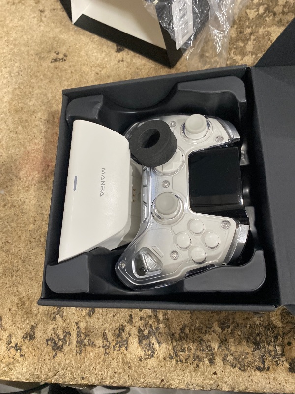 Photo 1 of ***ISSUES PAIRING WITH DONGLE*** ManbaOne Interactive Screen Wireless Gaming Controller for PC/Switch/Switch 2/iOS/Android,Hall Effect Stick & Trigger,RGB Lighting,Remappable Buttons,1800mAh with Charging Dock (White)
