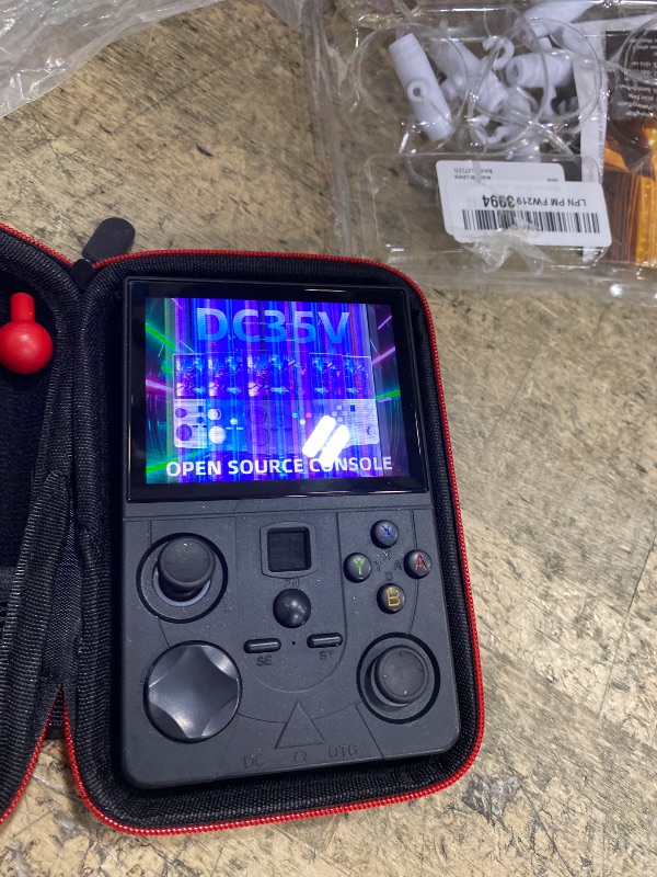 Photo 1 of ***FOR PARTS ONLY/ DAMAGED SCREEN AND JOYSTICK/ MISSING PIECES*** Retro Handheld Game Console, DC35V Retro Gaming Console 3.5’’IPS Screen Open Source Linux System Built-in 20000+Classic Games, 20+Emulators, Portable Video Gaming Console with 4000mAh Batte