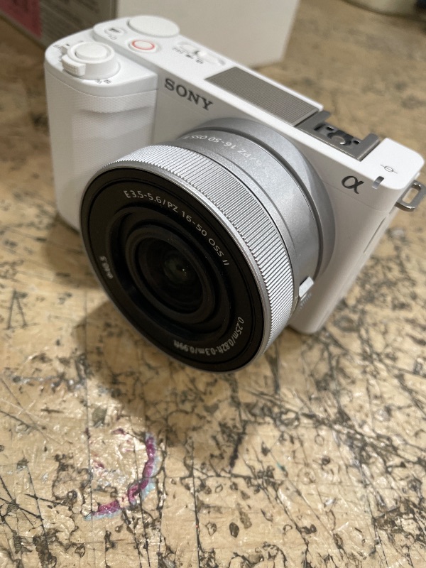 Photo 1 of **MISSING BATTERY, UNABLE TO TEST** Sony Alpha ZVE10 II - APS-C Interchangeable Lens Mirrorless Content Creators’ Camera - White - with Lens