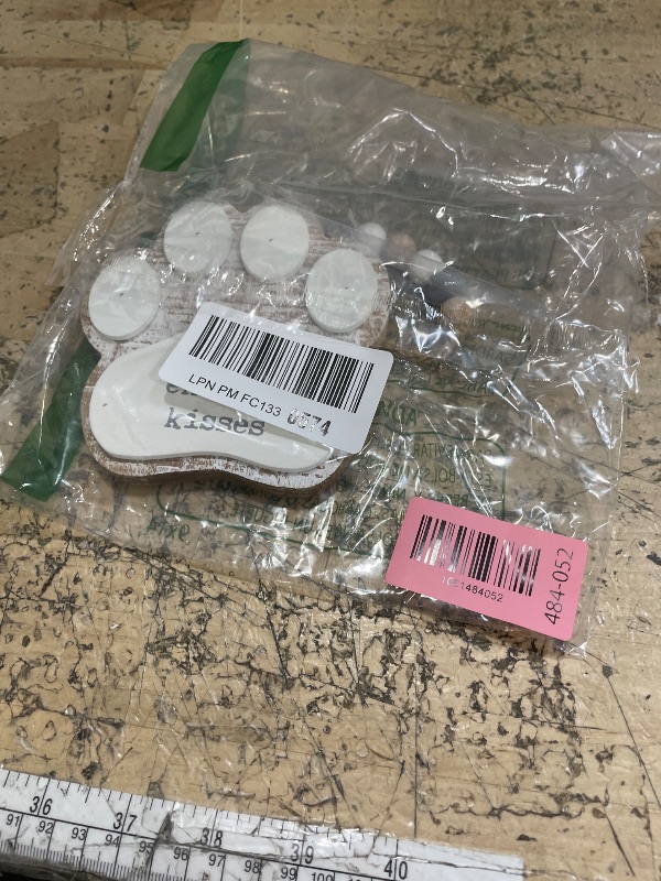 Photo 1 of 'Free Endless Kisses' Pawprint Sign