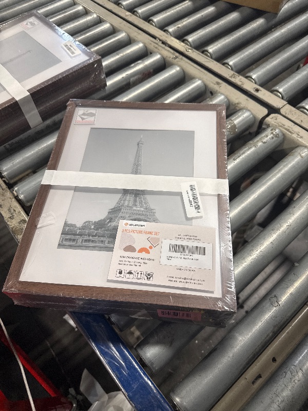 Photo 1 of ** FACTORY SEALED**
upsimples 11x14 Picture Frame Set of 5, Display Pictures 8x10 with Mat or 11x14 Without Mat, Wall Gallery Photo Frames, Brown