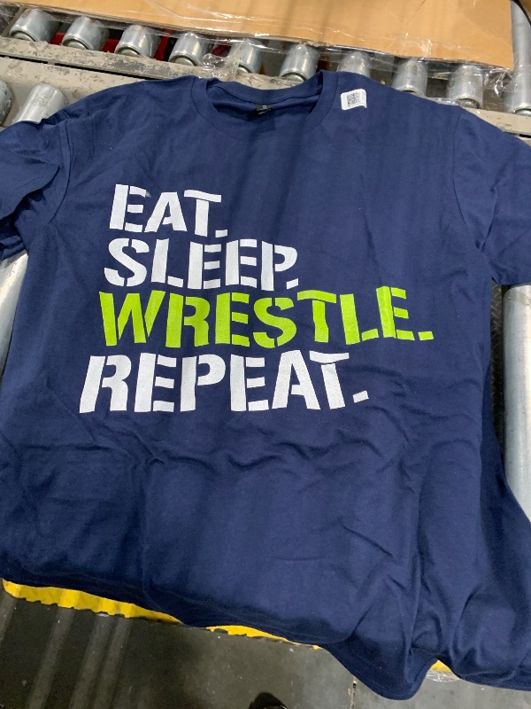 Photo 1 of SHORT-SLEEVED FLANNEL SHIRT, SIZE L, WITH DESIGN